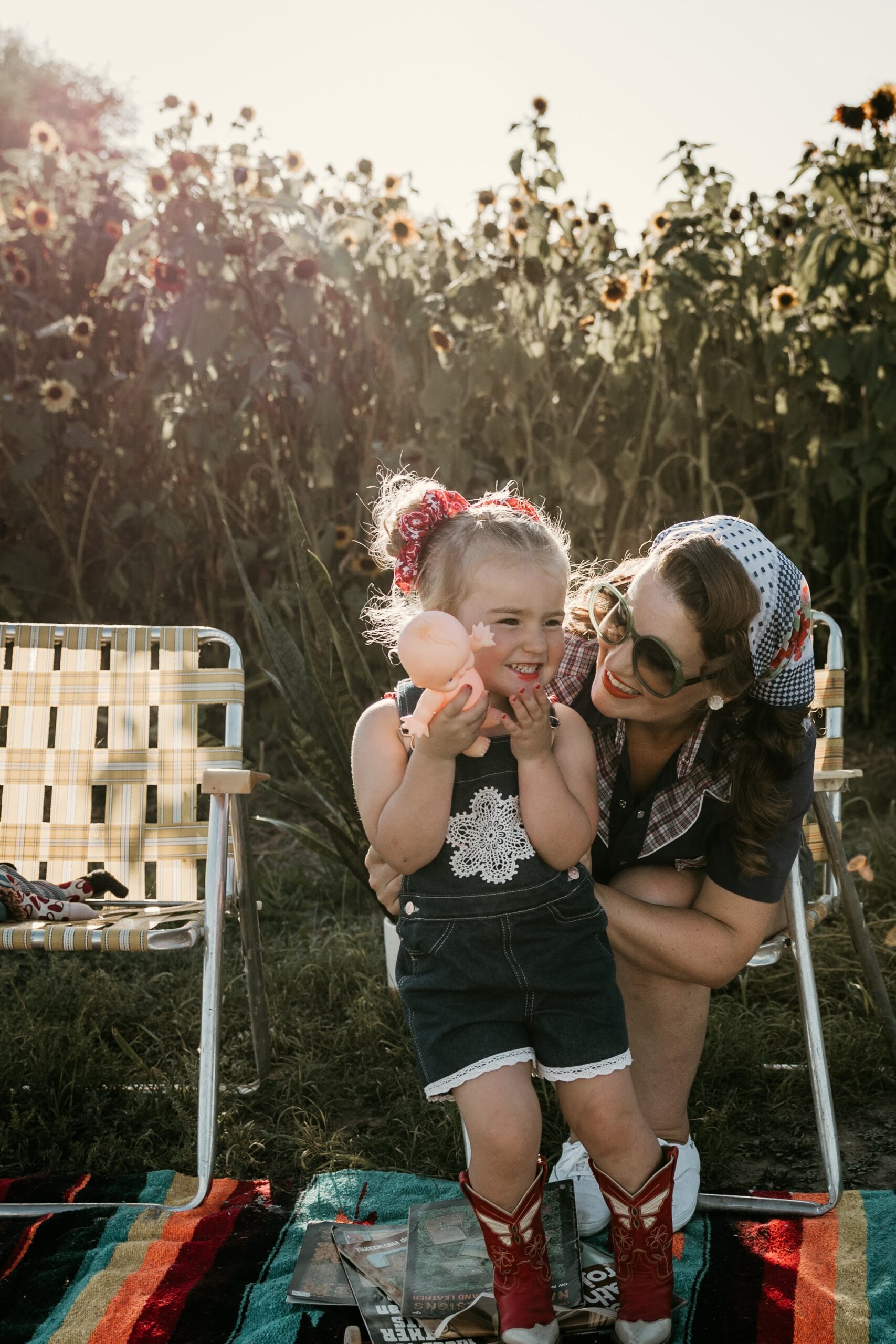 mother and daughter laugh during a retro inspired photoshoot in Southern Saskatchewan